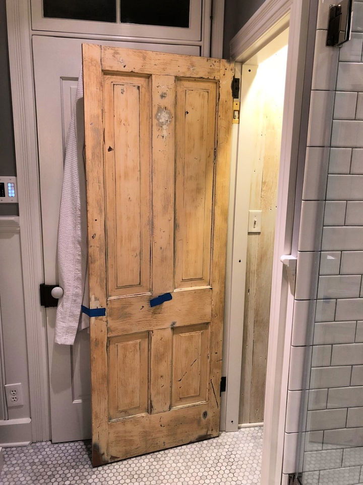 Hanging Salvaged Door with Antique Hinges