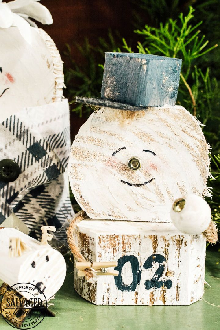 Unique Scrap Wood Snowman Family