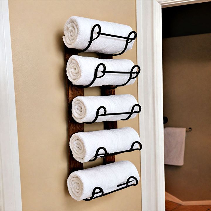 repurposed wine rack towel display