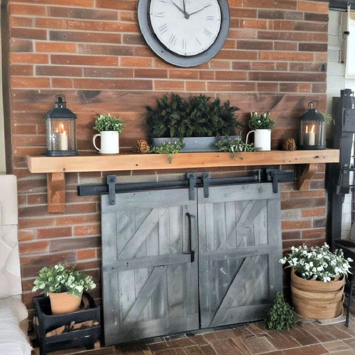 barn door fireplace cover