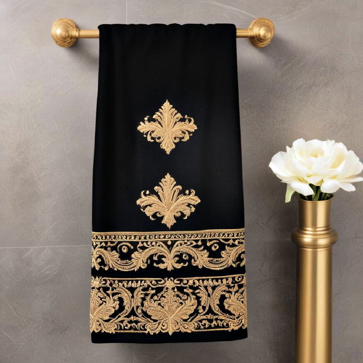 bathroom black towels with gold embroidery