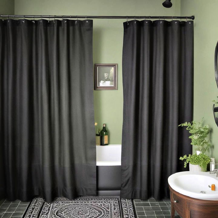 black shower curtain with green wall