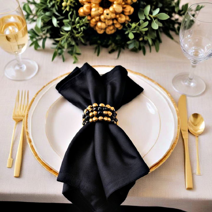 elegance black and gold beaded napkin rings