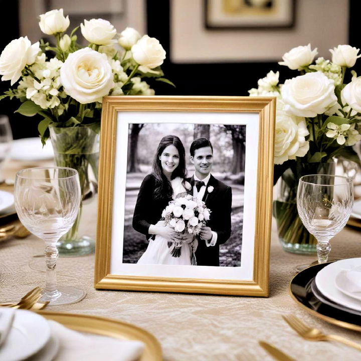 elegant gold picture frame with black photos