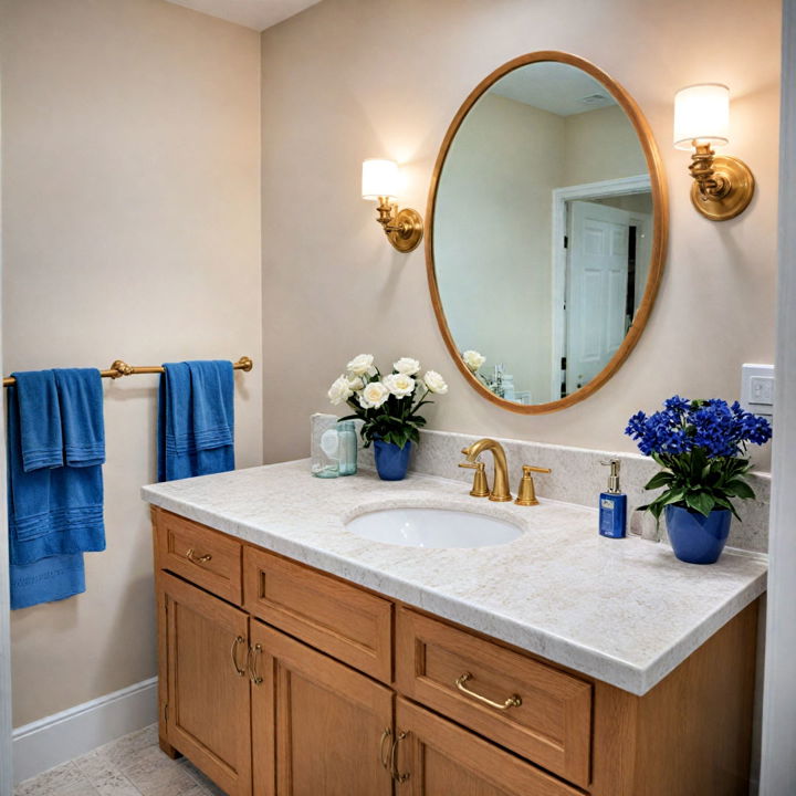 gold framed mirrors and blue accessories