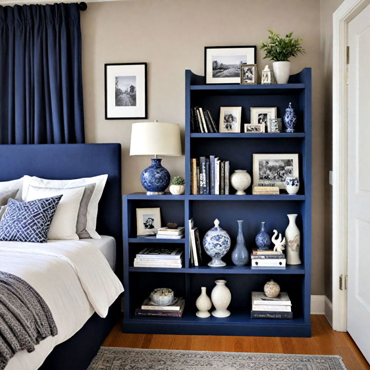 navy blue bookshelf with grey accessories