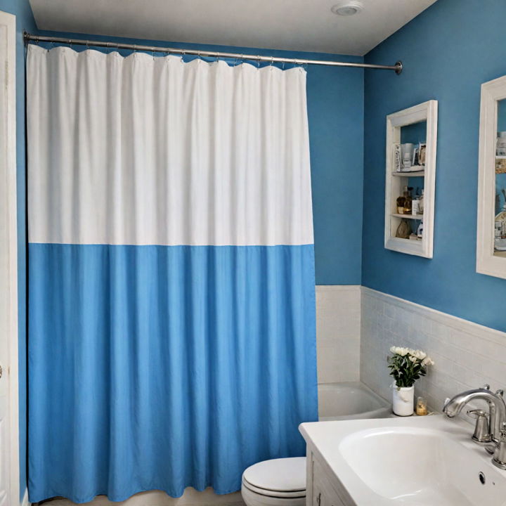 simple blue shower curtain with white liners