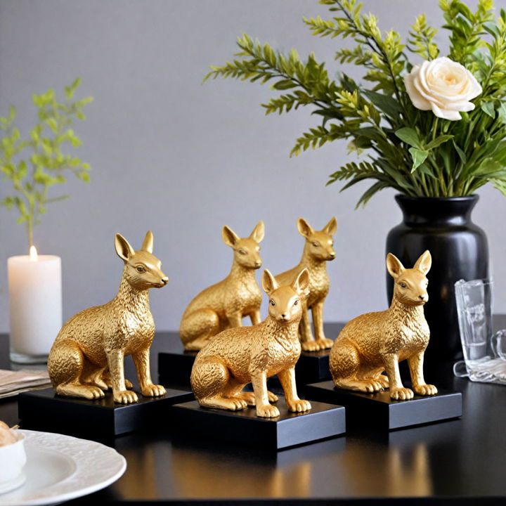 whimsical gold animal figurines with black bases