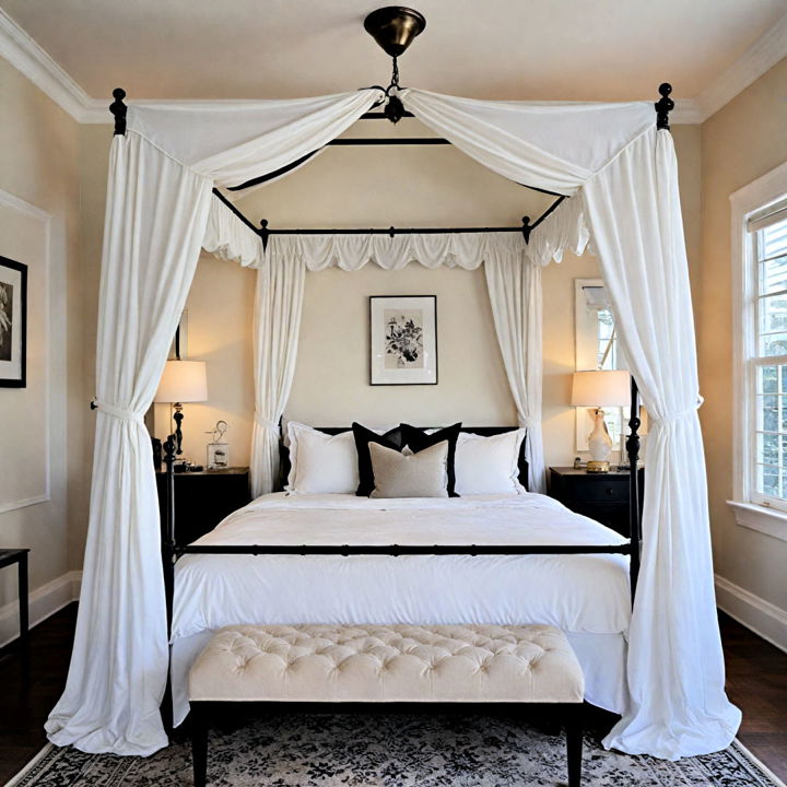 white canopy bed with black trim