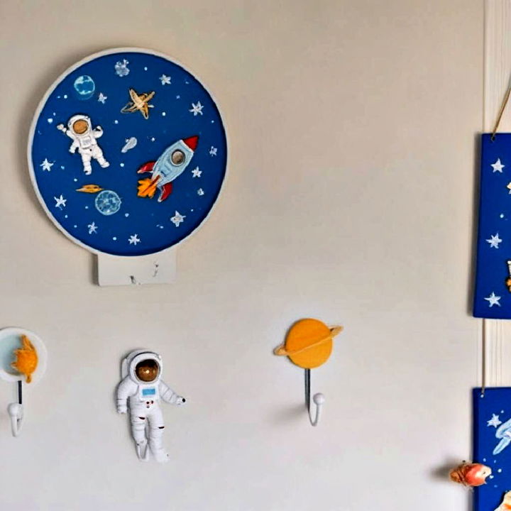 astronaut wall hooks to hang baby clothes