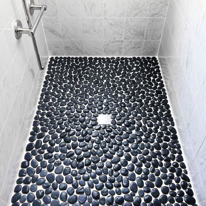 black pebble tiles bathroom