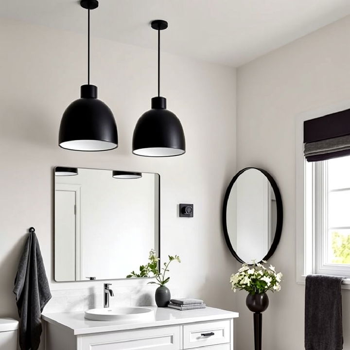 black pendant lights over the bathroom vanity