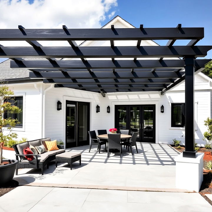 black pergola over a white patio