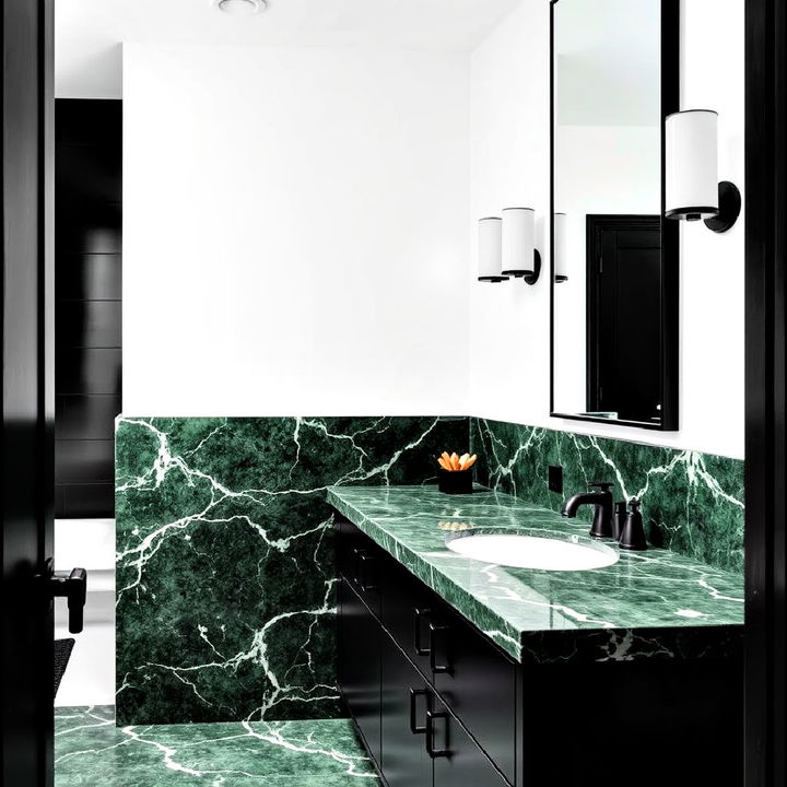 green marble countertops in a monochromatic bathroom setting