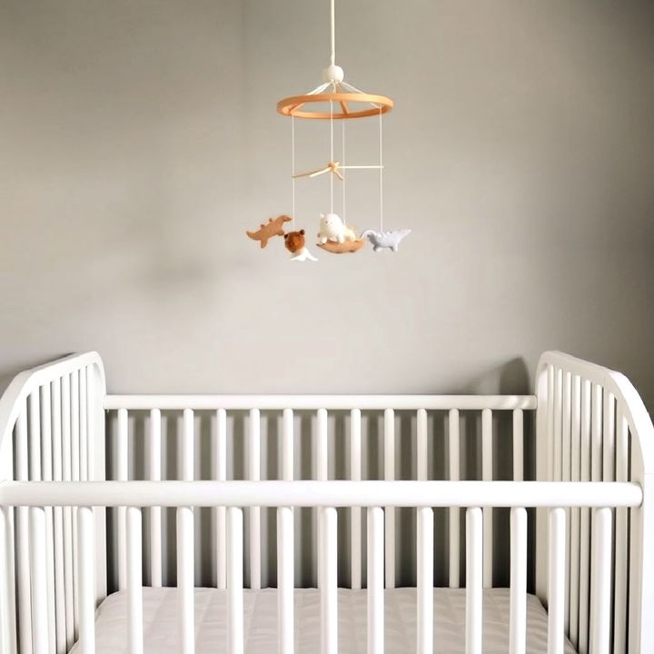 minimalist mobile above the crib