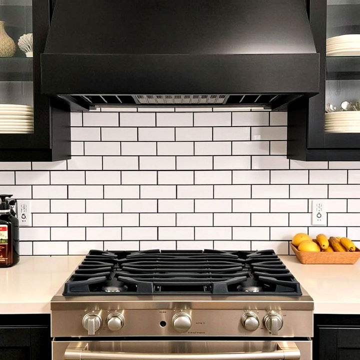 modern subway tile with dark grout backsplash