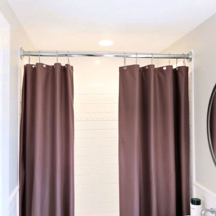 shower curtain on a ceiling mounted track