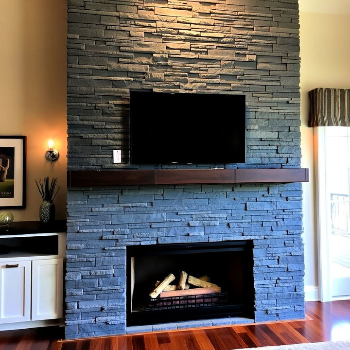 stacked slate fireplace with tv niche