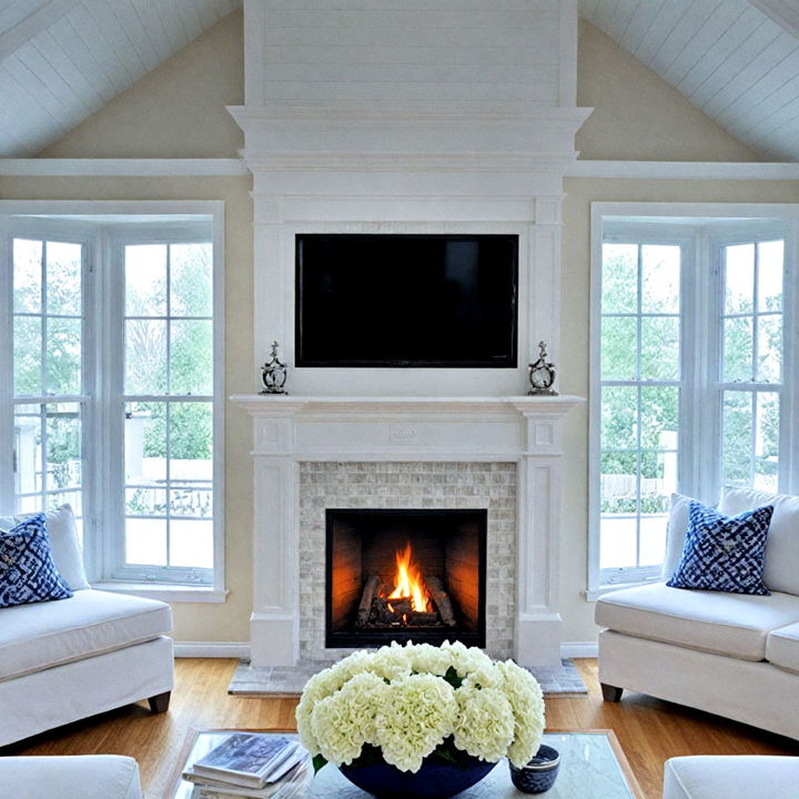 tiled fireplace with framed bay windows