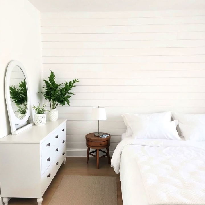 white shiplap accent wall for bedroom