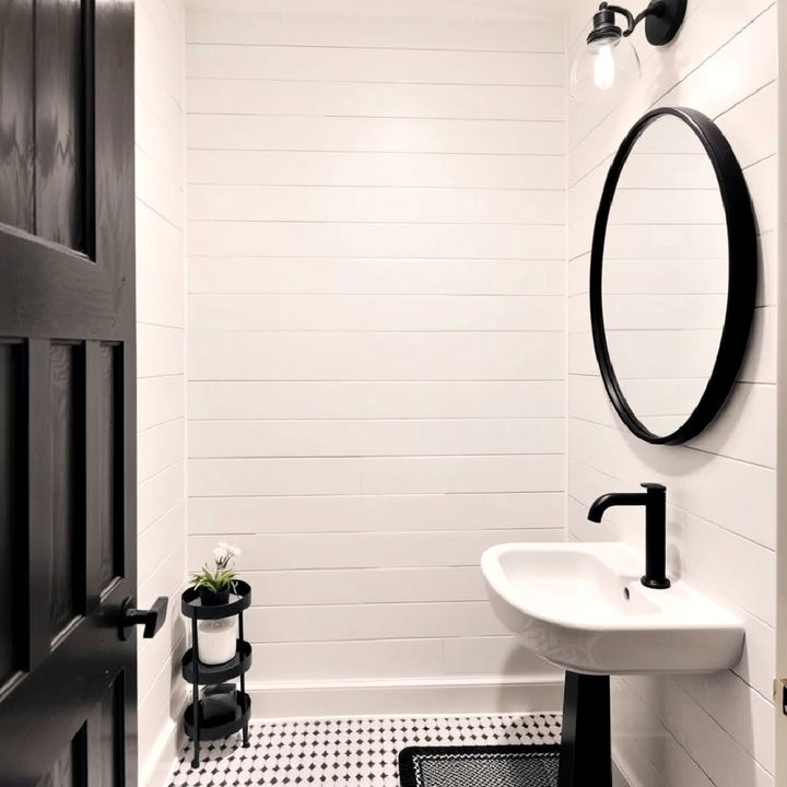 white shiplap bathroom with black fixtures