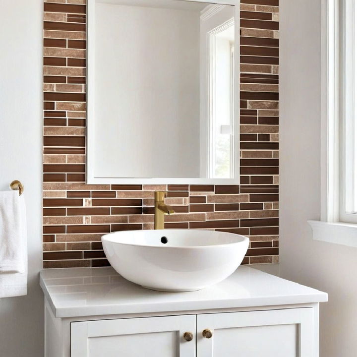 white sink with brown tiled backsplash