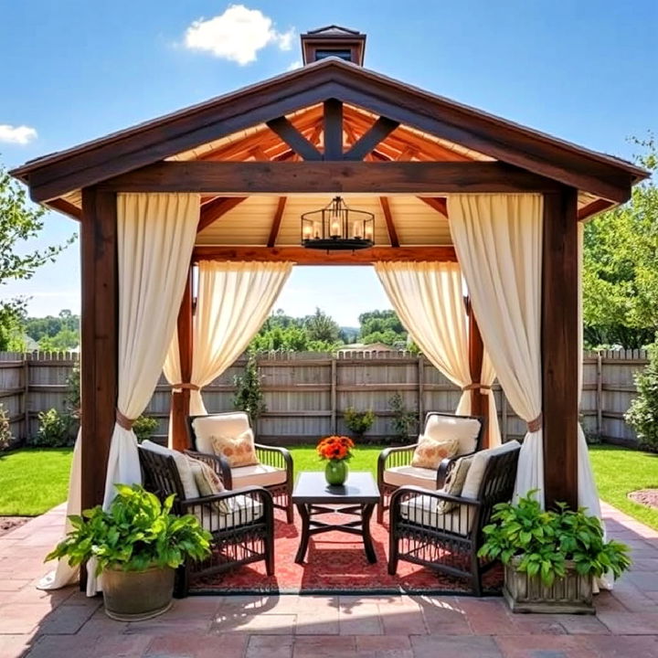 charming rustic gazebo with flowing curtains