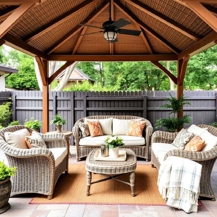 cozy vibe gazebo with wicker furnishings