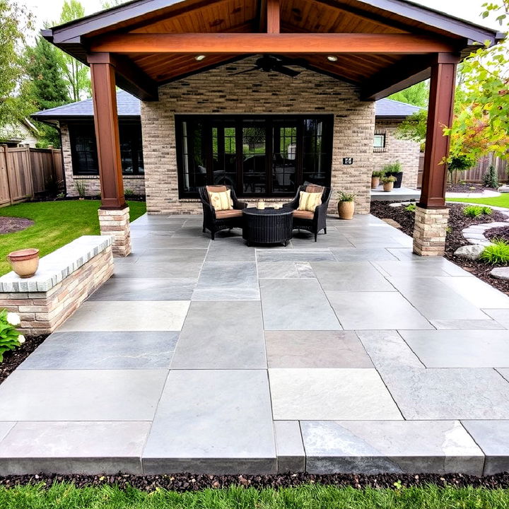 dramatic large stone slab designs in a stamped concrete patio