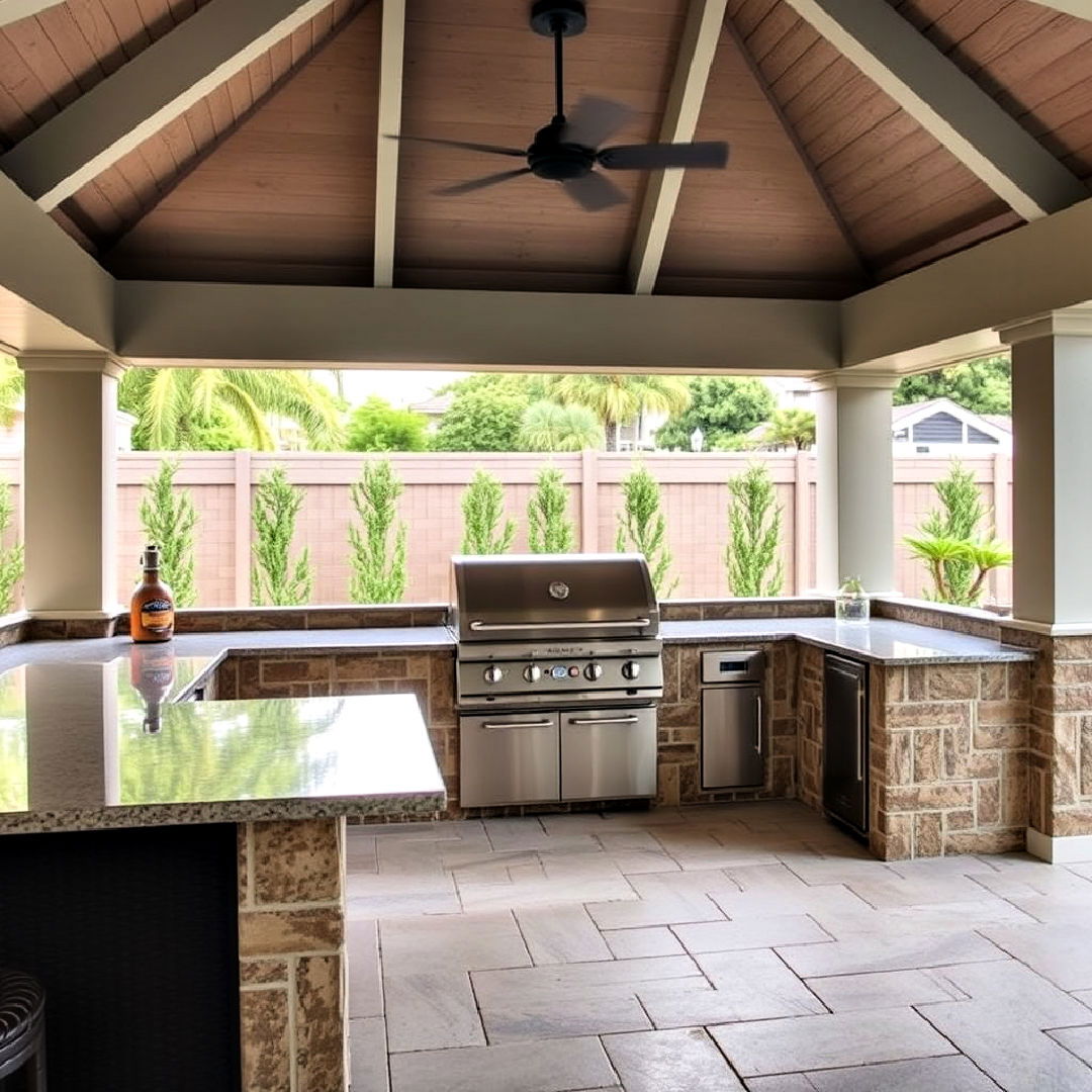 pool house with outdoor kitchen and built in grill