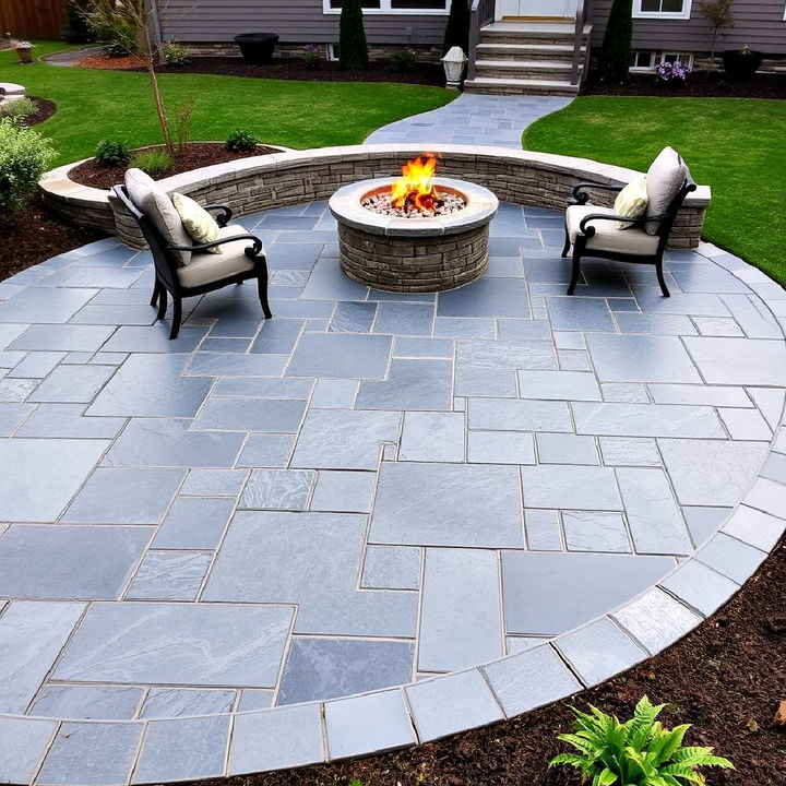 slate look stamped concrete with raised fire pit for drama